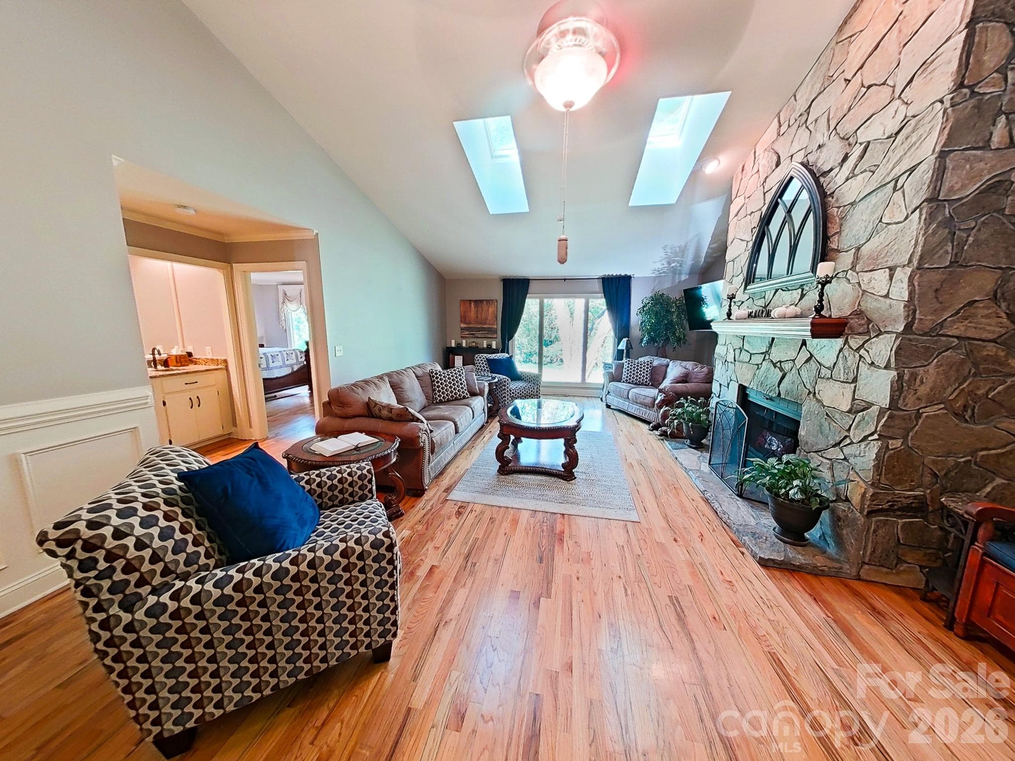 Living Room with Vaulted Ceilings, Skylight windows & Fire Place - 1004 Kenilworth Court NW, Concord