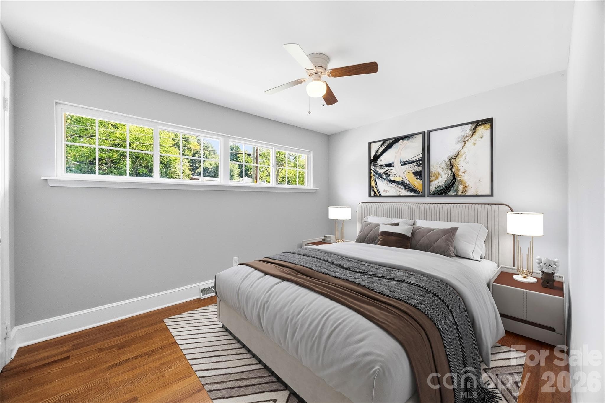 This is a look at the guest BR. This look features a virtual image so buyers can see the space with furniture. - 6506 Candlewood Drive, Charlotte