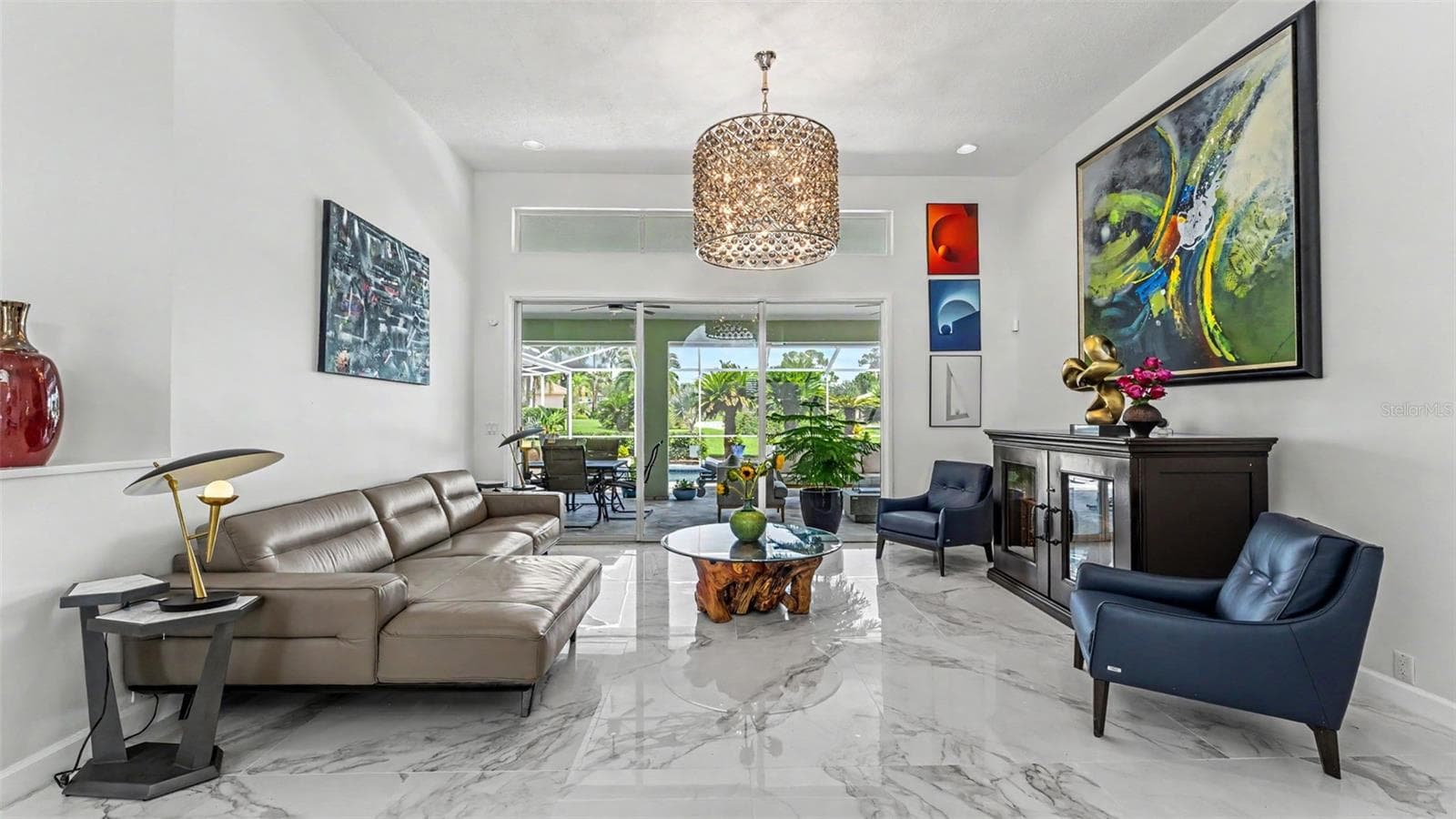 Living Room- fantastic view upon entering out to a tropical paradise - 3417 BARLEY CT, LAKELAND