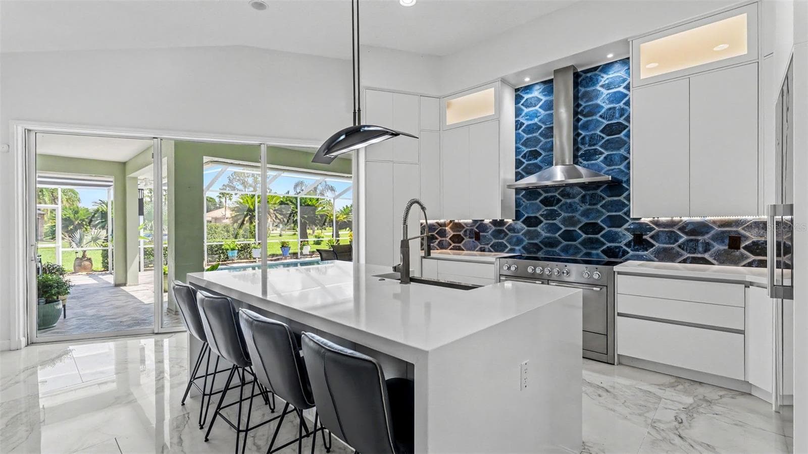 Kitchen with breakfast bar at island - 3417 BARLEY CT, LAKELAND