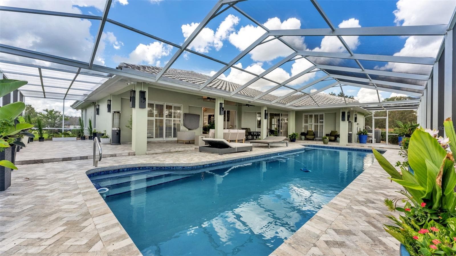 Side screened patio area perfect for grill and cook outs! - 3417 BARLEY CT, LAKELAND