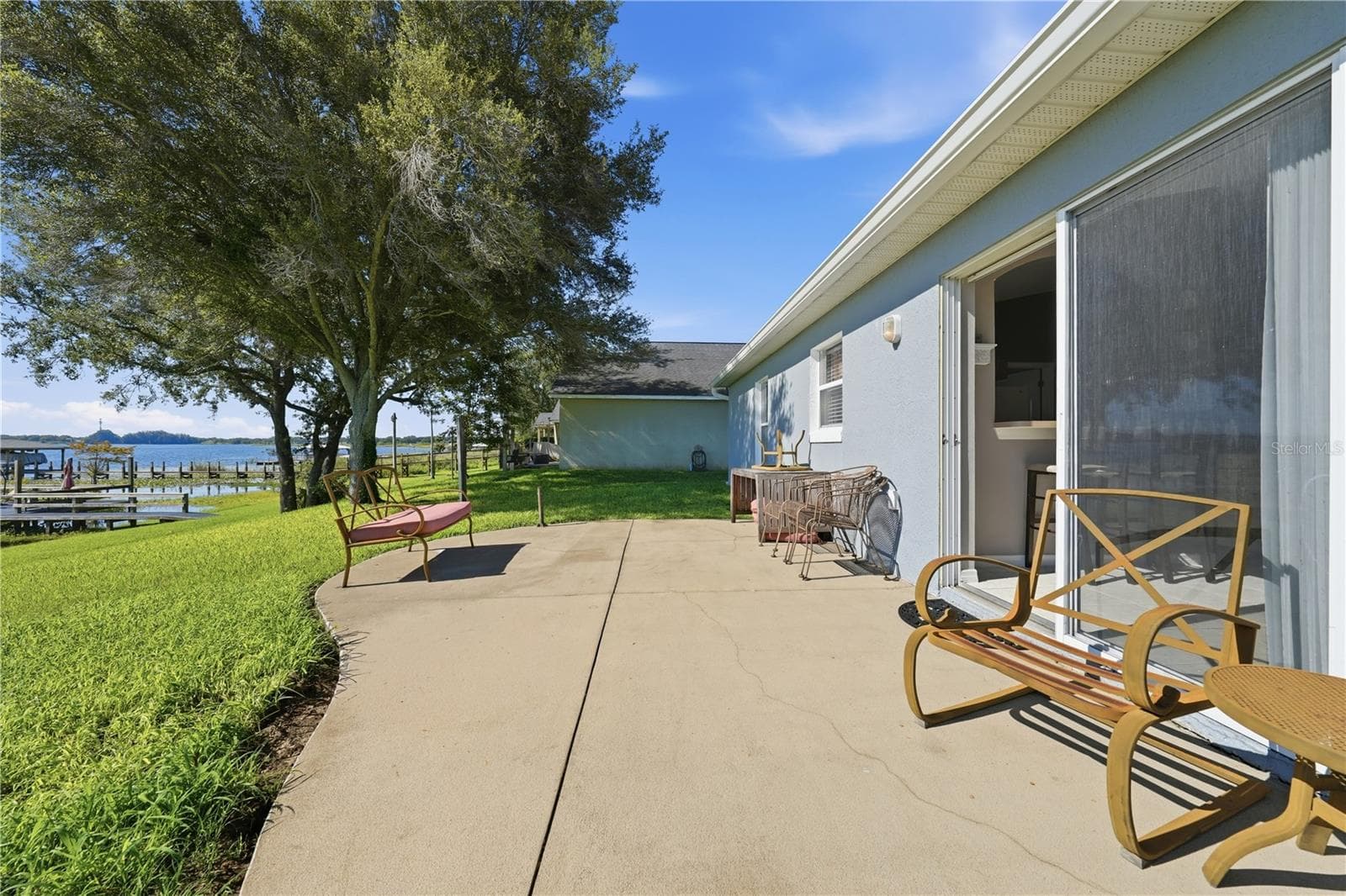 Patio overlooking Lake Saunders - 1827 LAKE VILLA DR, TAVARES