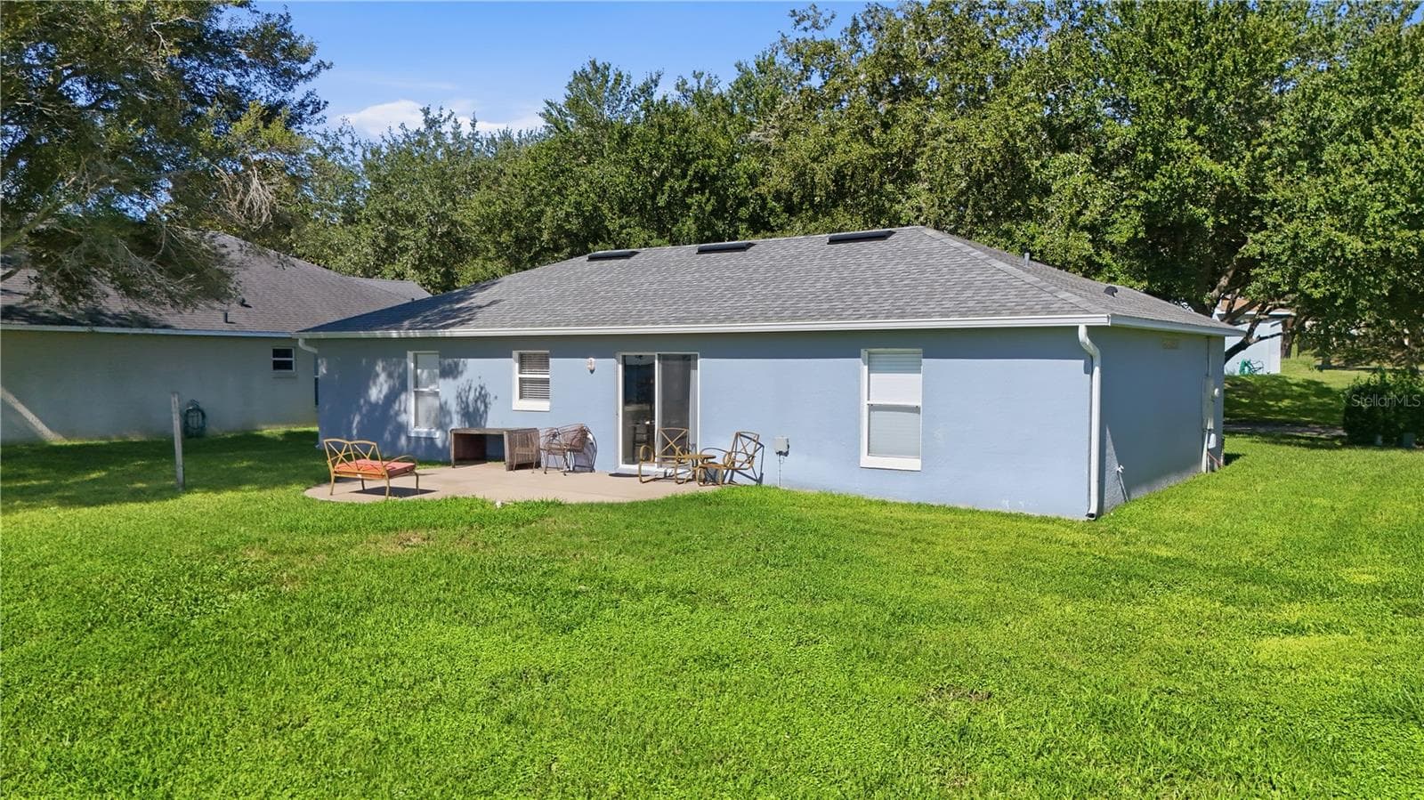 Looking back at the home from the lake - 1827 LAKE VILLA DR, TAVARES