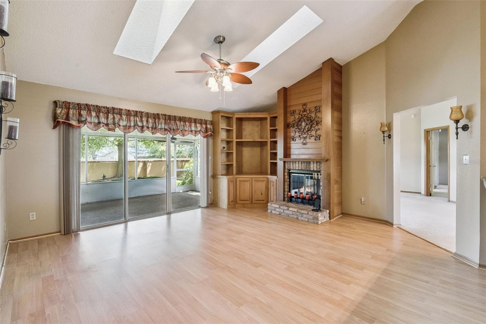 Family Room With Built-in and Wood Burning Fireplace - 288 RINGWOOD DR, WINTER SPRINGS