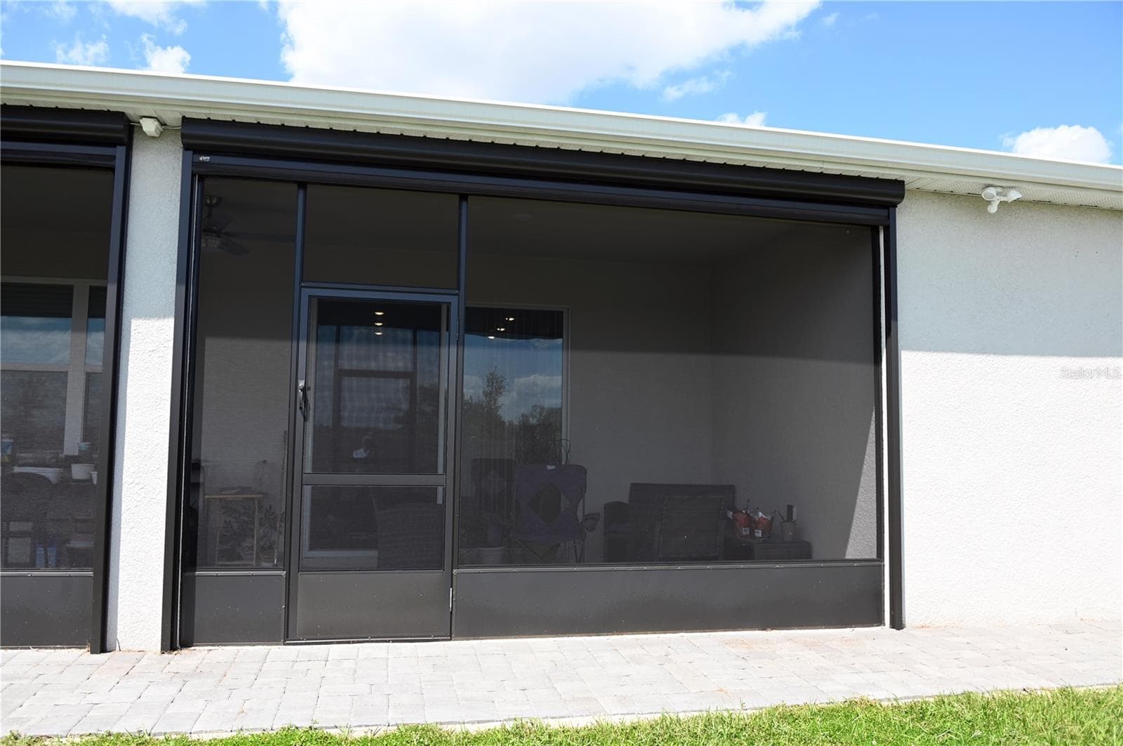 Veranda area without motorized screen down - 4104 GOOSEBERRY TRL, KISSIMMEE