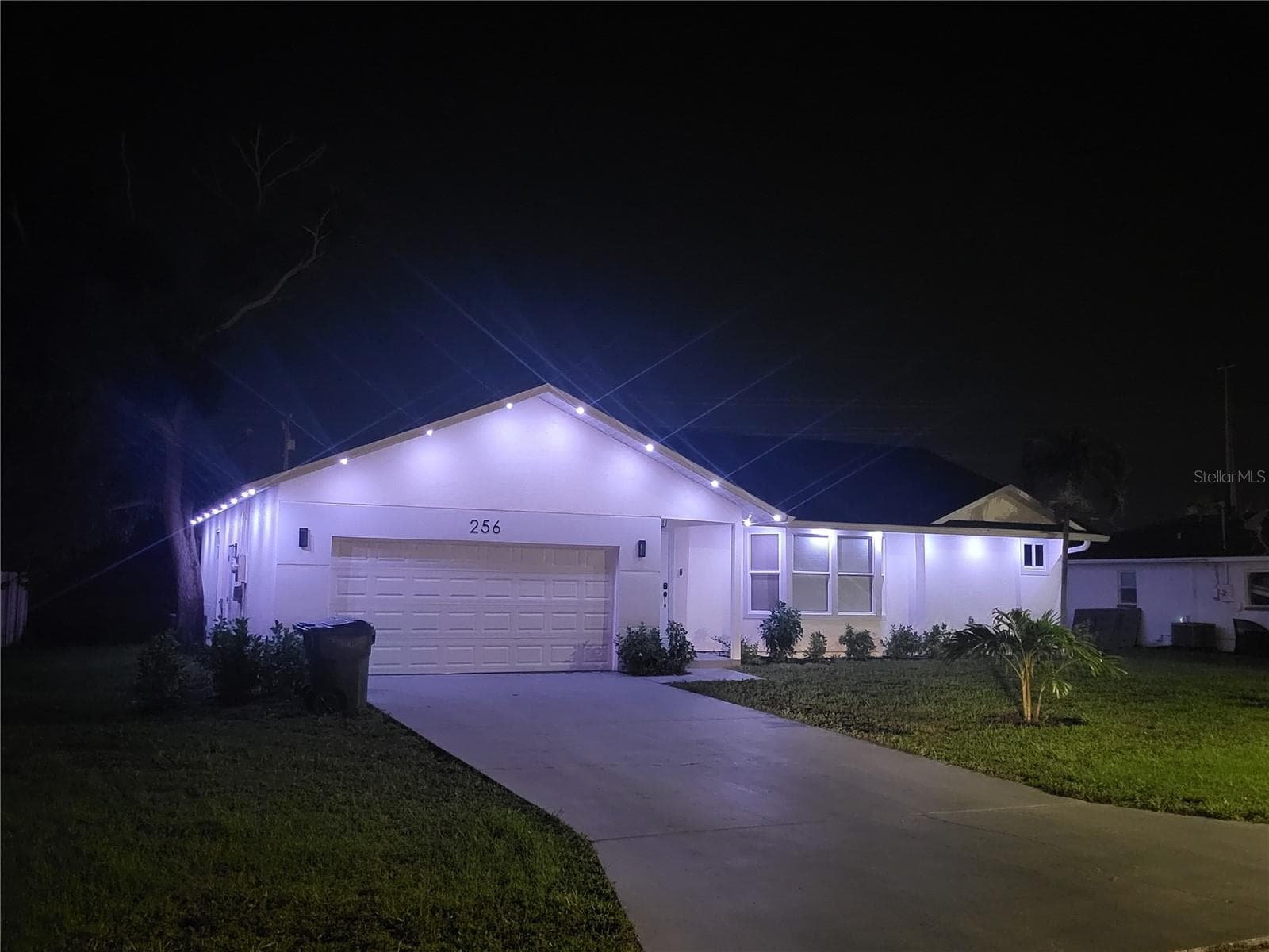 A PREMIUM JELLYFISH LIGHTING SYSTEM was professionally installed along ALL EAVES, permanent outdoor LED lighting fully customizable & SMARTPHONE-CONTROLLED w/ endless color options, elegant accent lighting & built-in programs for holidays & special occasions, NO MORE HANGING SEASONAL LIGHTS! - 256 SE SANTA BARBARA PL, CAPE CORAL
