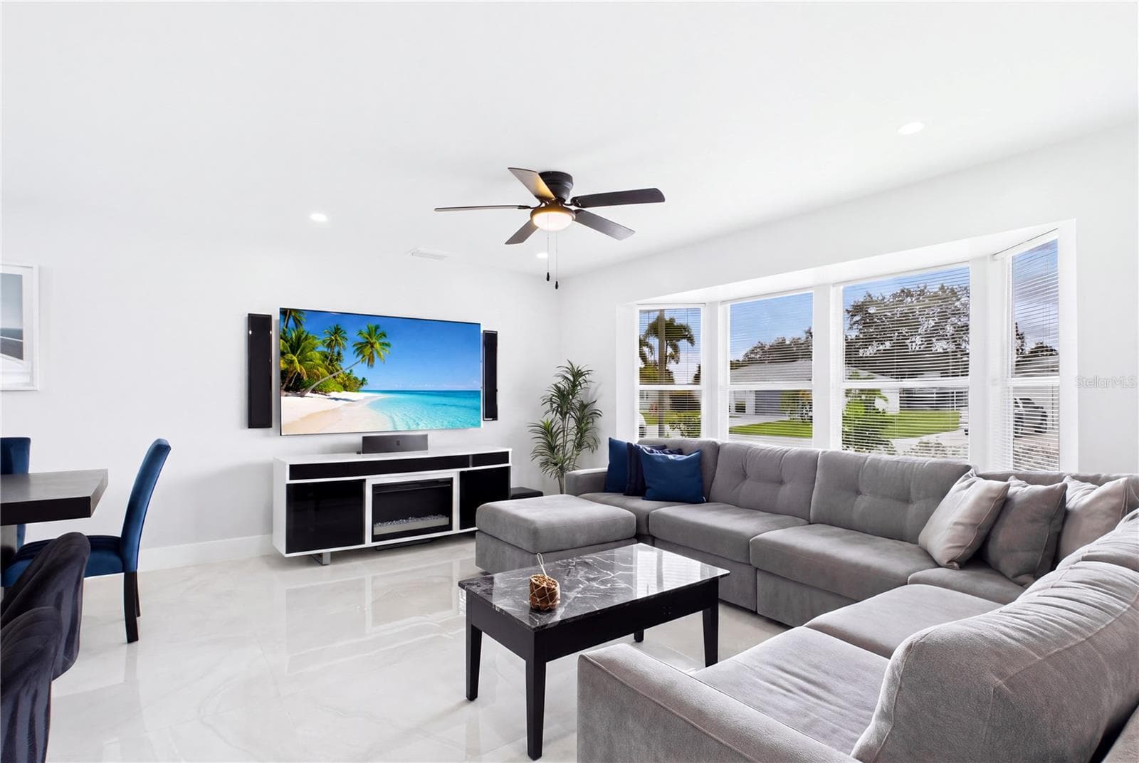 Generous proportions provide plenty of room for oversized seating while maintaining an open, airy flow. - 256 SE SANTA BARBARA PL, CAPE CORAL