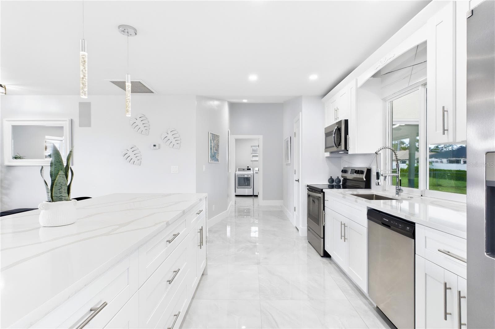 A WALK-IN PANTRY added in 2026 provides additional storage! - 256 SE SANTA BARBARA PL, CAPE CORAL