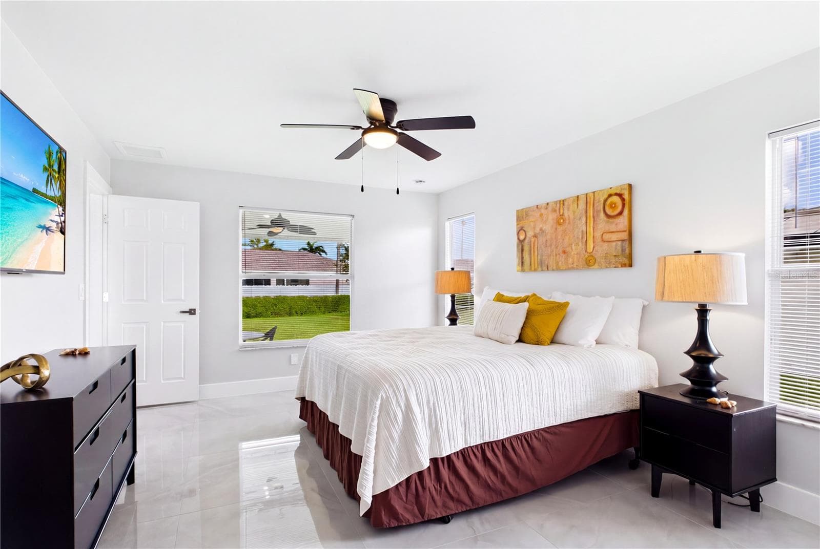 Generous proportions easily accommodate a king-size bedroom suite while maintaining an open, comfortable feel. - 256 SE SANTA BARBARA PL, CAPE CORAL