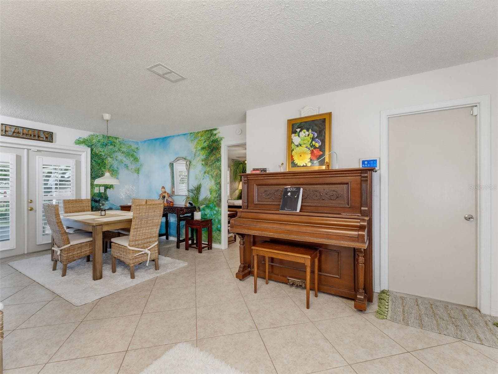 FOYER ENTRY WITH GARAGE ACCESS TO THE RIGHT AND DINING TOWARDS BACK - 11113 NORVELL RD, SPRING HILL
