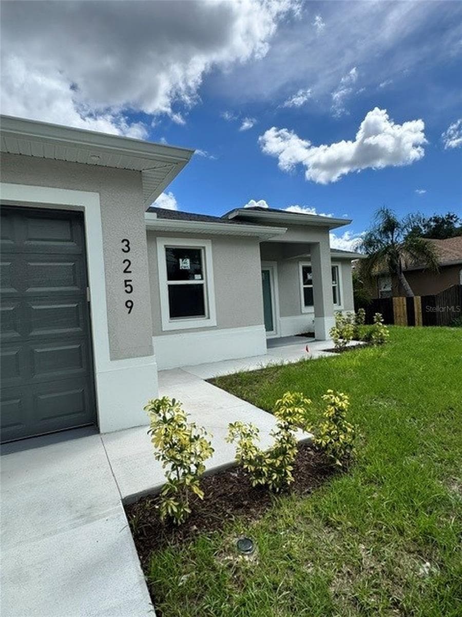 Front landscaping - 3259 LANGMAID AVE, NORTH PORT