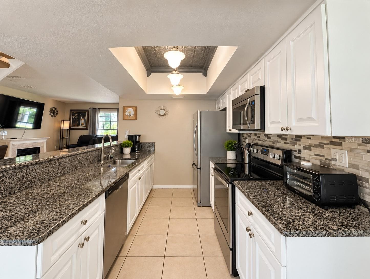 kitchen side view - 5434 SADDLEBROOK WAY #3, WESLEY CHAPEL
