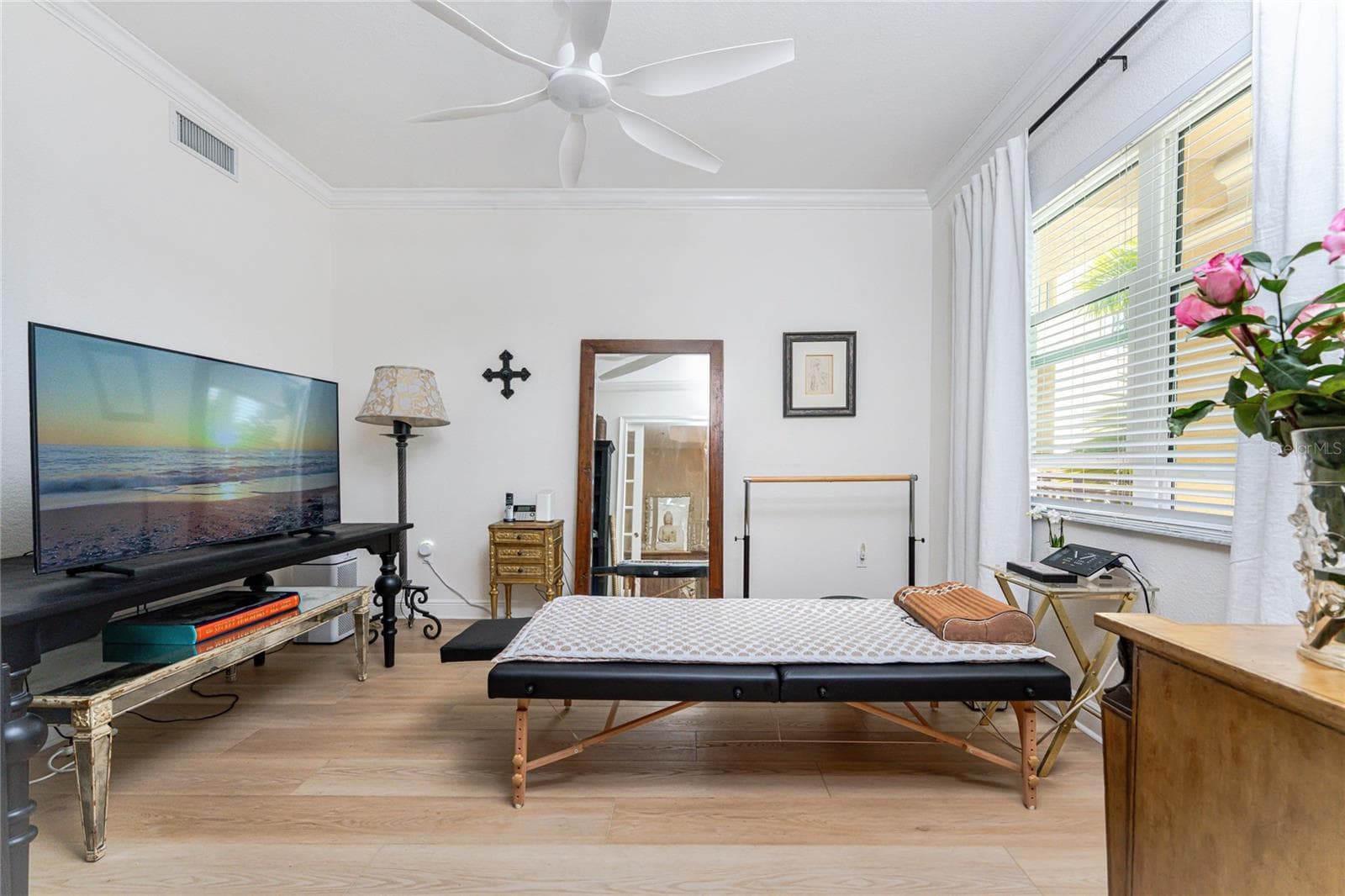 A versatile bonus room currently used as wellness space. - 95 N MARION CT #135, PUNTA GORDA