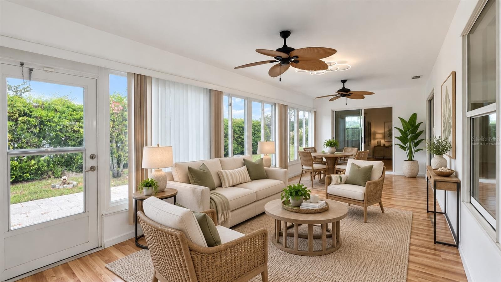 400 sq ft enclosed, air-conditioned lanai. Virtually staged. - 6501 SW 84TH PLACE RD, OCALA