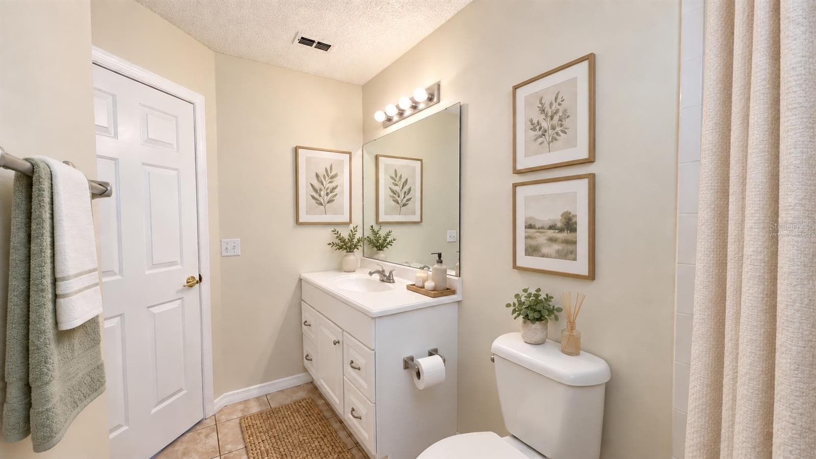 Guest bathroom is spacious. Virtually staged. - 6501 SW 84TH PLACE RD, OCALA