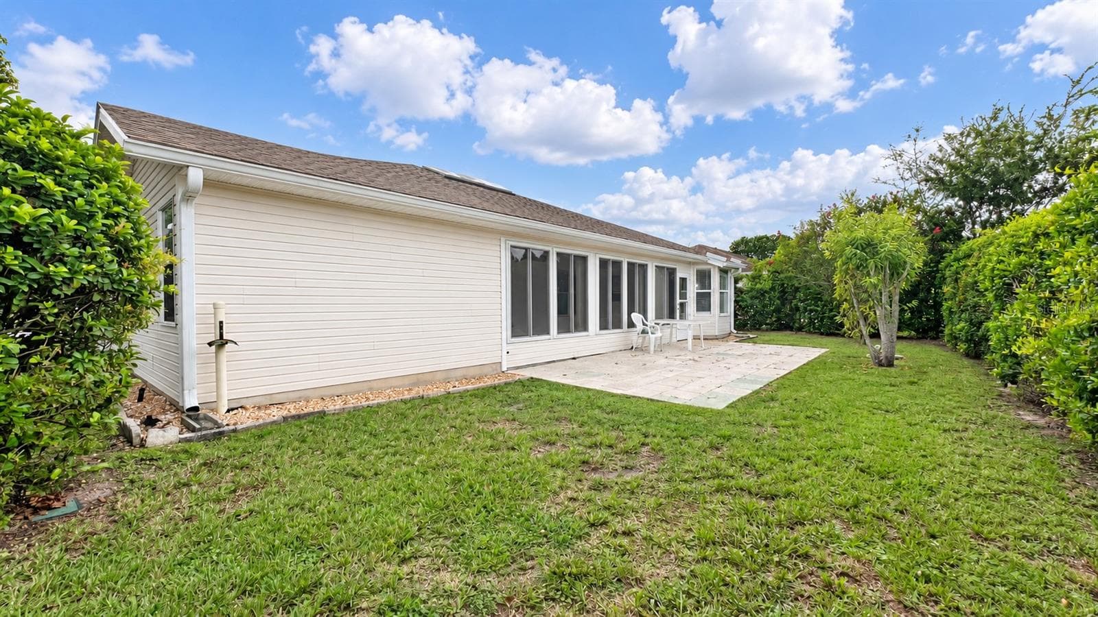 Large back patio with plenty of space to entertain and privacy. - 6501 SW 84TH PLACE RD, OCALA