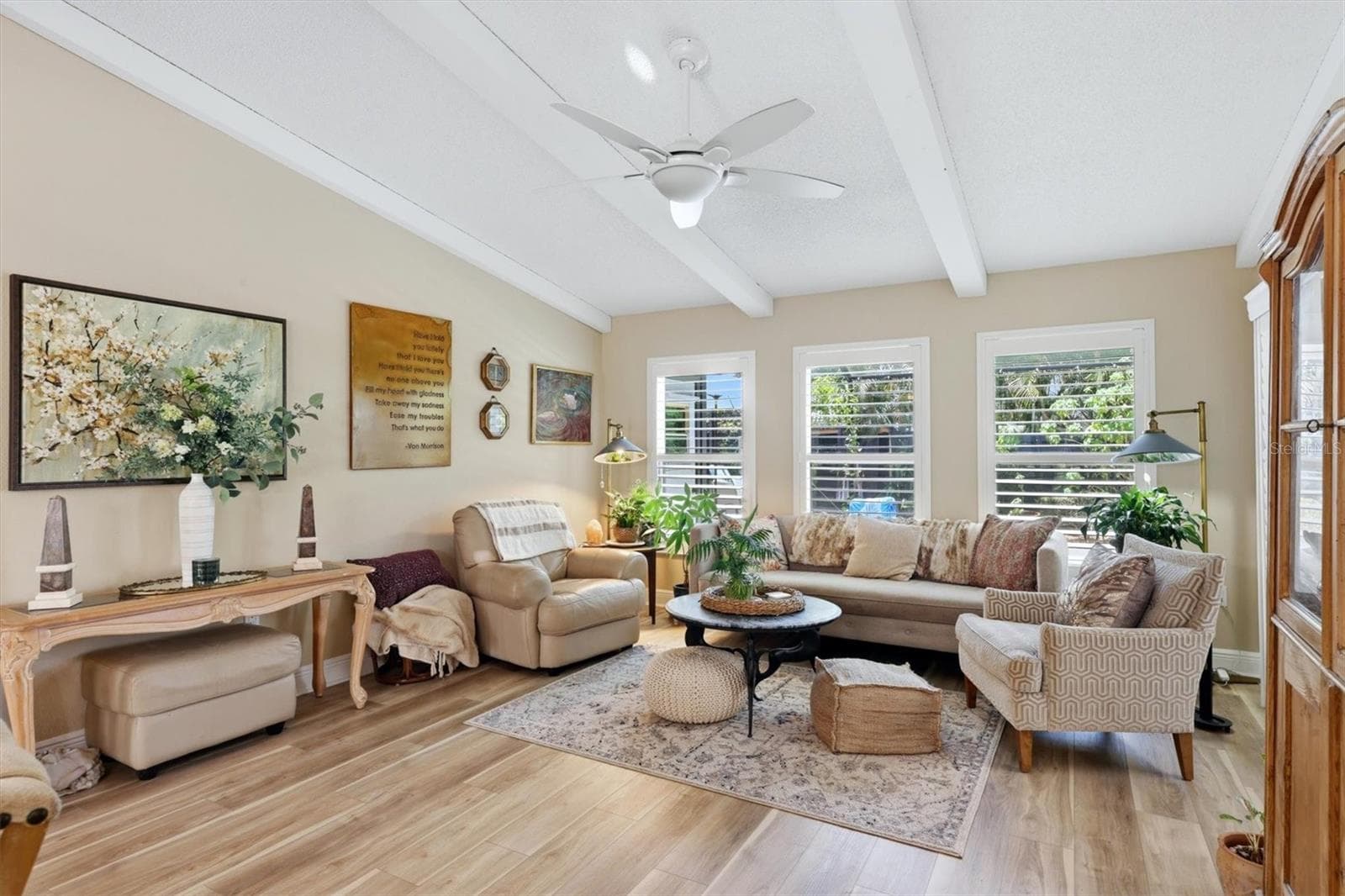Living room, Luxury vinyl floors, sliding door to cover lanai - 3828 EASTON ST, SARASOTA