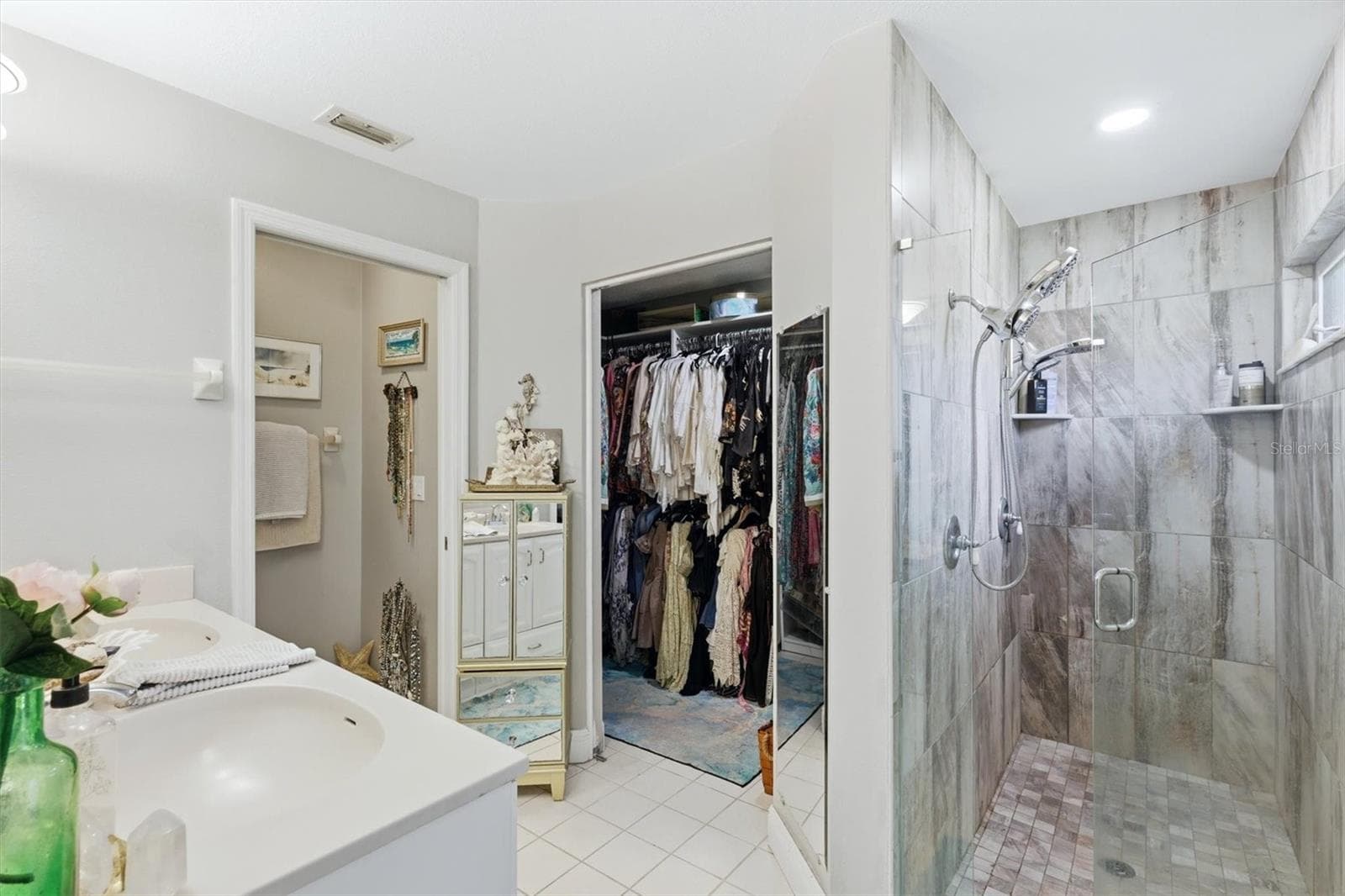 Primary Bathroom with walk in shower, large closet space - 3828 EASTON ST, SARASOTA