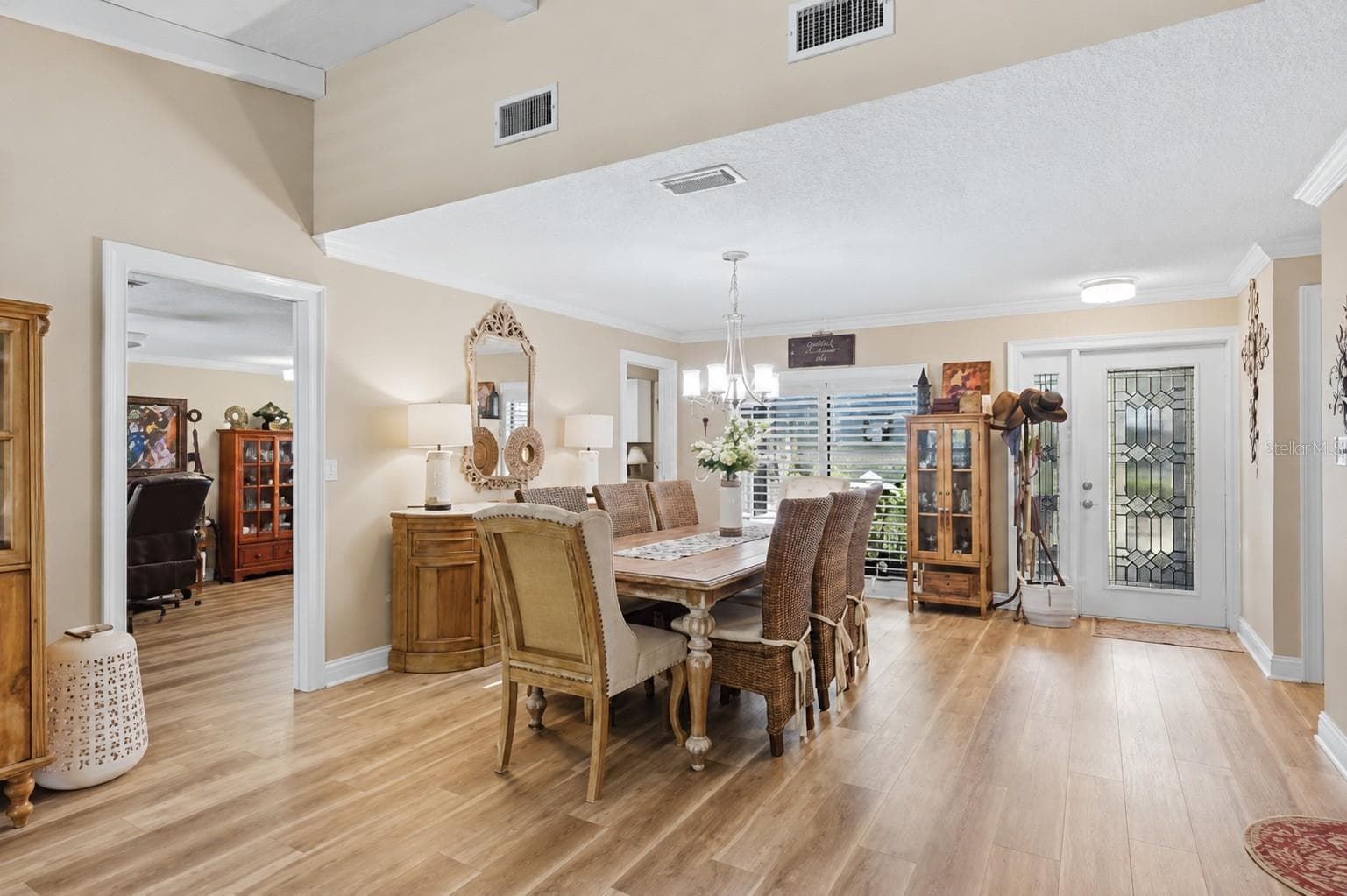 Dining room /Living room with Luxury vinyl floors - 3828 EASTON ST, SARASOTA