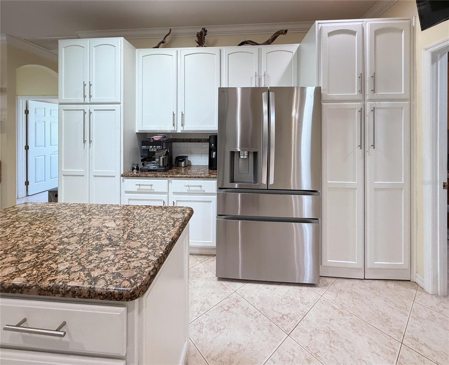 Pantry on Left. Washer/Dryer on R. of Fridge - 157 SORRENTO RD, POINCIANA