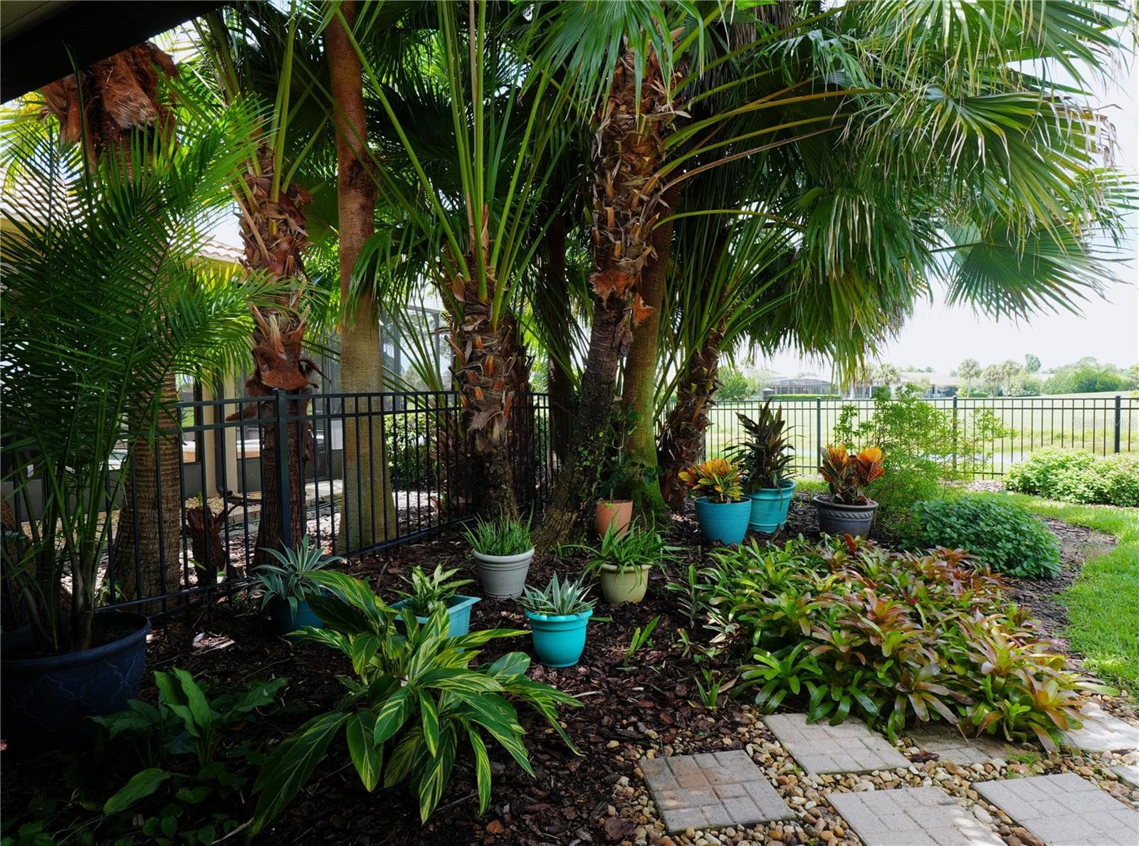 Floral Garden Backyard - 157 SORRENTO RD, POINCIANA