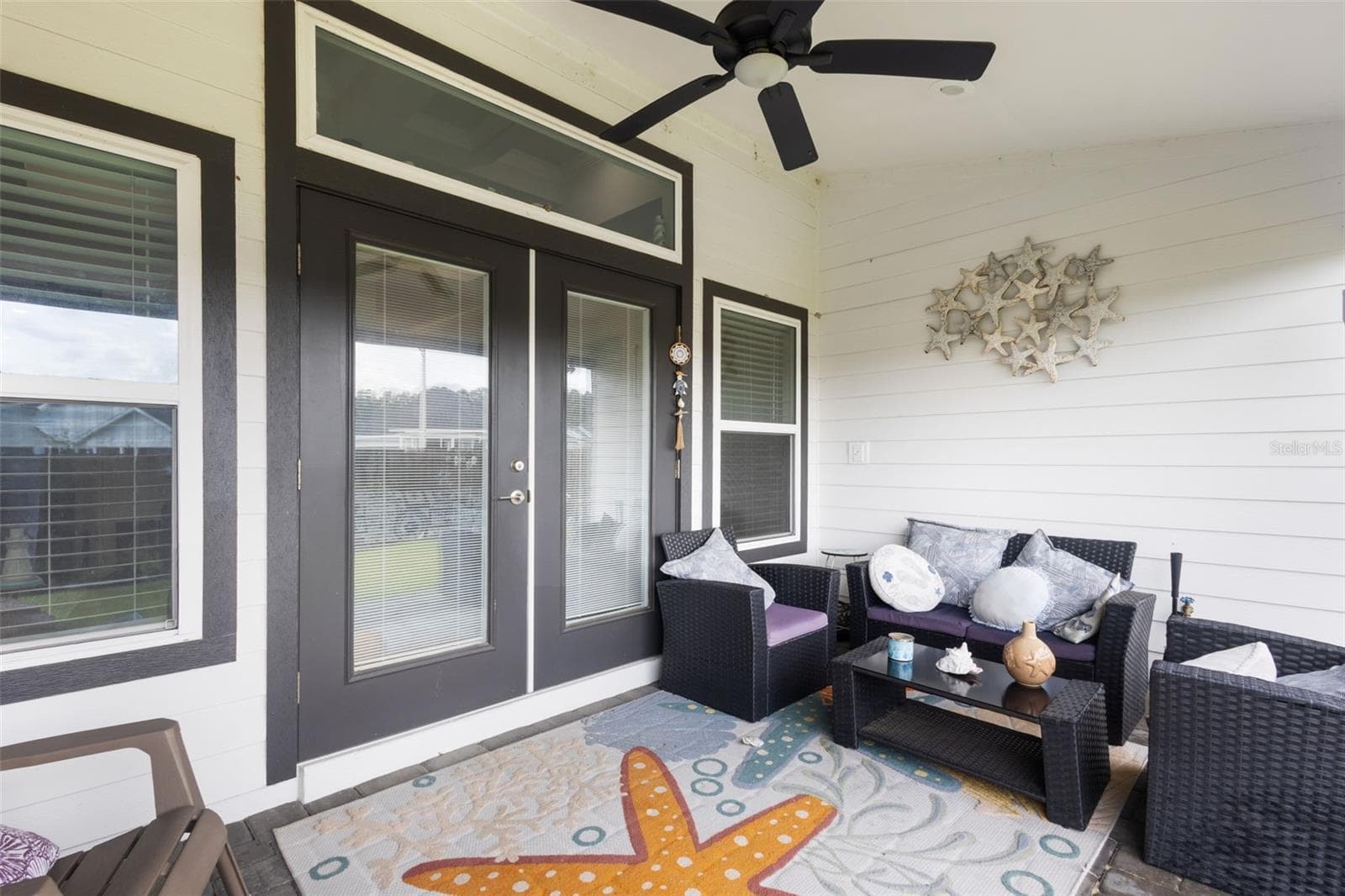 Covered back porch - 12635 NW 162ND DR, ALACHUA