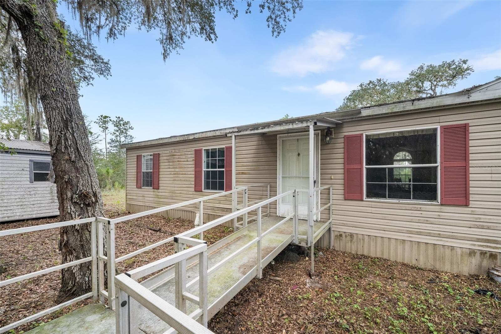 Manufactured Home at 12490 NE 75TH ST, BRONSON, photo 3 of 54