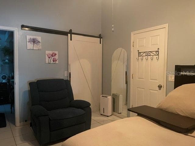 Primary bedroom walk in closet and en suite bathroom - 2250 SPRINGWOOD CIR W, CLEARWATER