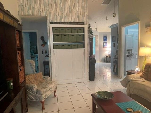 View from Family room to Hall and entrance - 2250 SPRINGWOOD CIR W, CLEARWATER