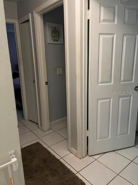Front hall to bedrooms 2 & 3 and the garage - 2250 SPRINGWOOD CIR W, CLEARWATER