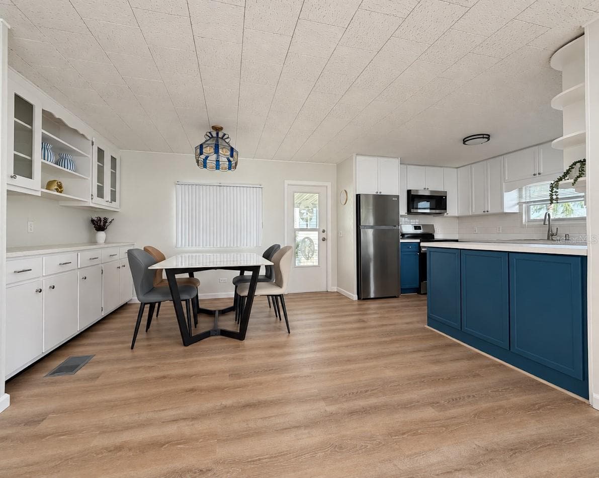 dining to kitchen - 1100 BELCHER RD S #64, LARGO