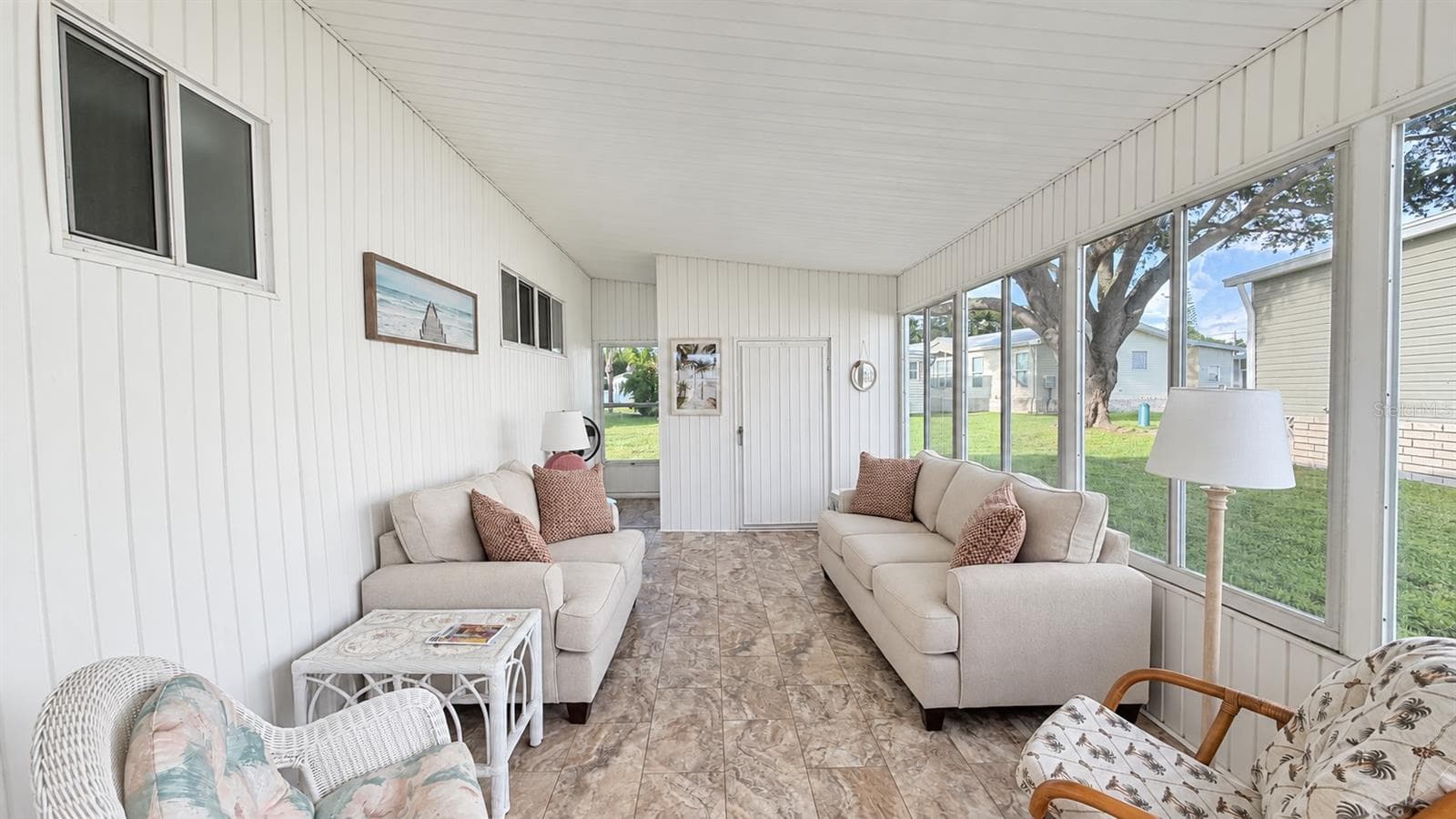 Florida room under carport - 1100 BELCHER RD S #64, LARGO