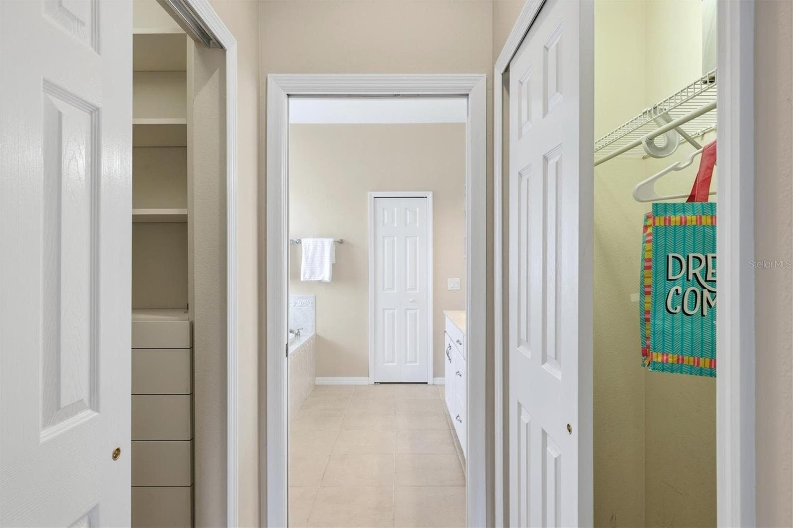 Primary Closets - 8138 VICTORIA FALLS CIR, SARASOTA