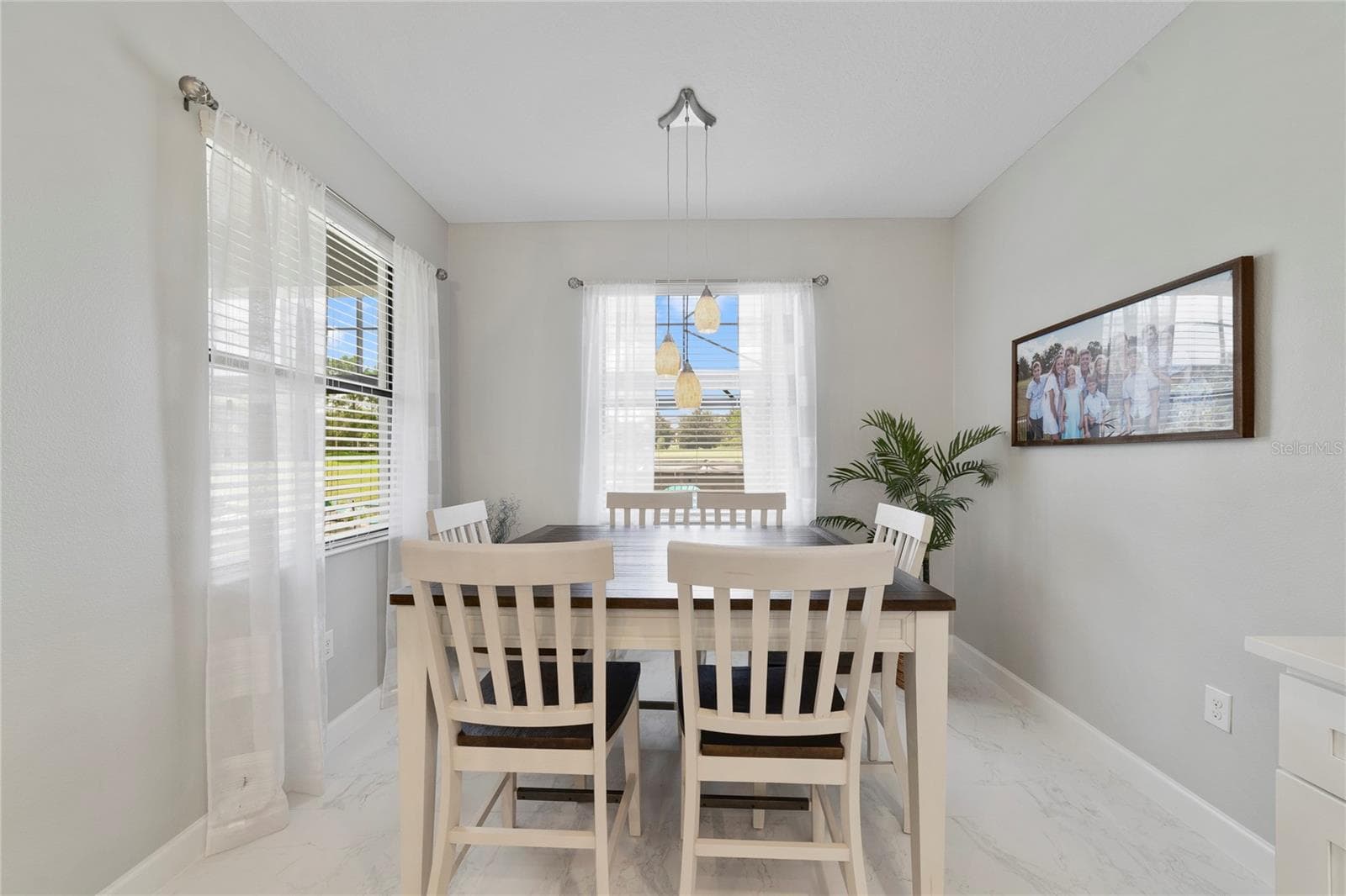 Dining Nook attached to Kitchen. - 1456 MICKELSON CT, DAVENPORT