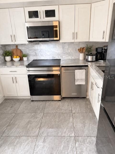 Virtual Staged - 2618 COVE CAY DR #102, CLEARWATER