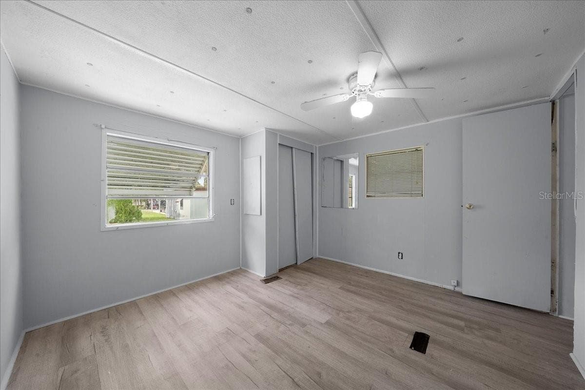 Primary Bedroom - 1314 TEAKWOOD LN, LADY LAKE