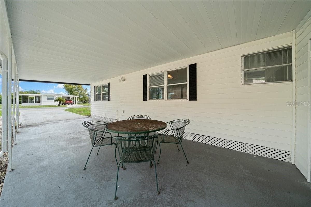 Carport - 1314 TEAKWOOD LN, LADY LAKE