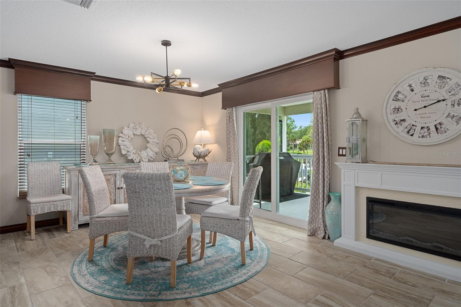 Dining room (fireplace does not convey). RIVER FRONT VIEW - 5517 TROPIC DR, NEW PORT RICHEY