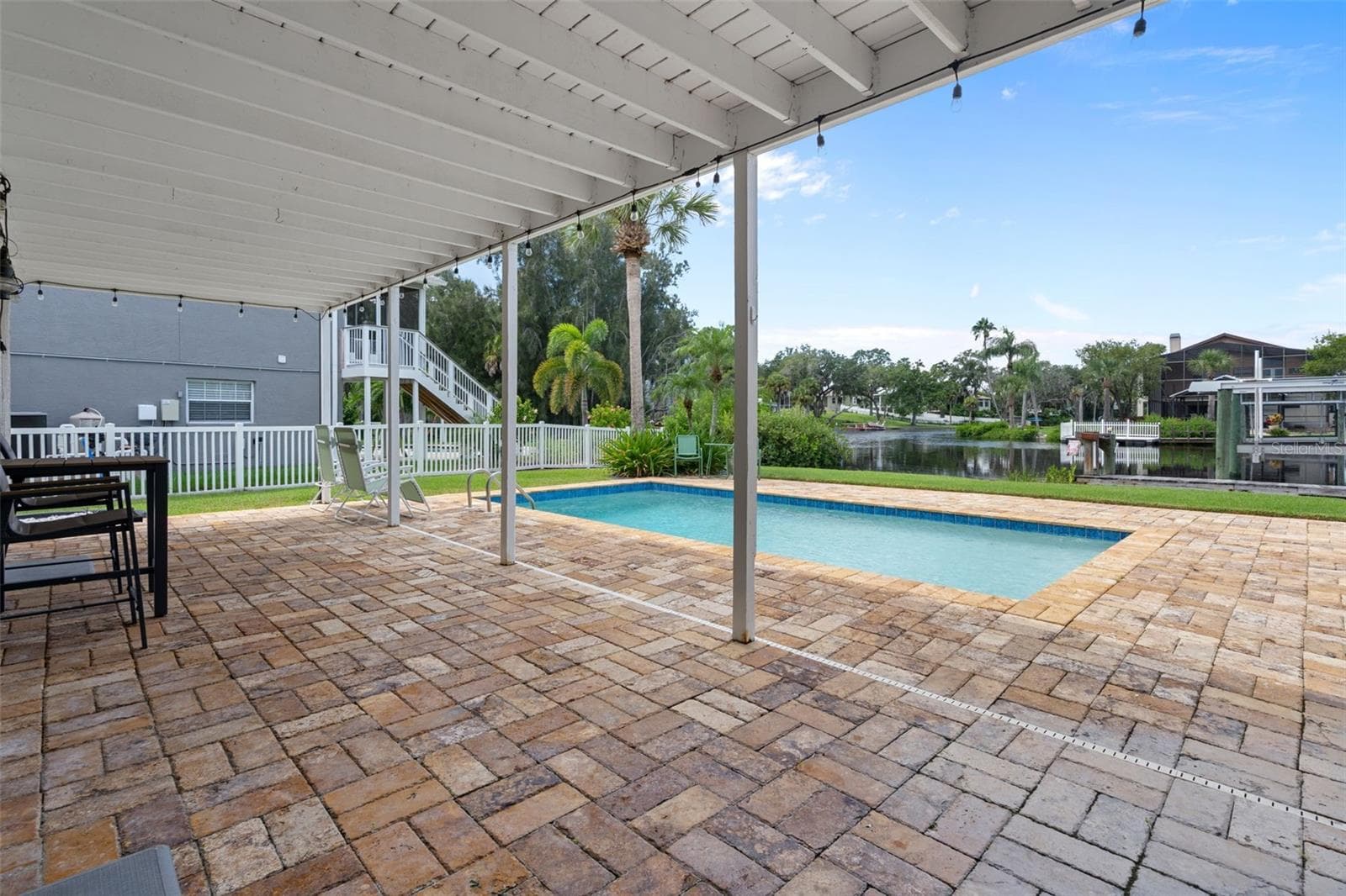 Covered pool deck and pool - 5517 TROPIC DR, NEW PORT RICHEY