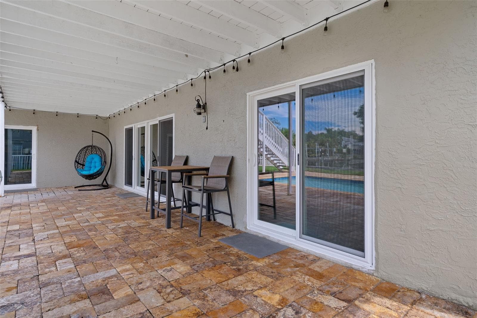 Covered pool deck - 5517 TROPIC DR, NEW PORT RICHEY