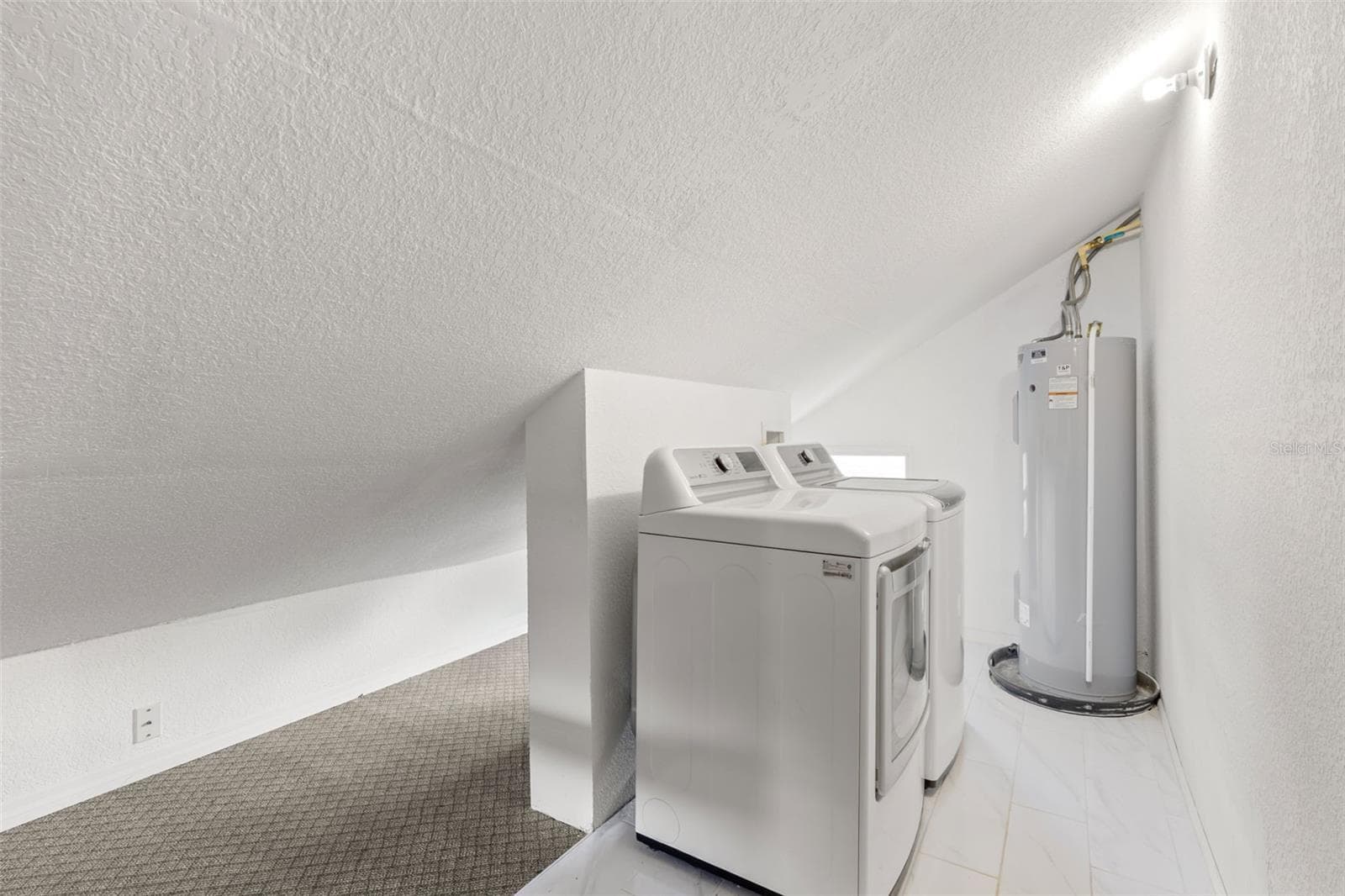 laundry and storage room, upstairs - 2010 DARTMOUTH AVE N, ST PETERSBURG