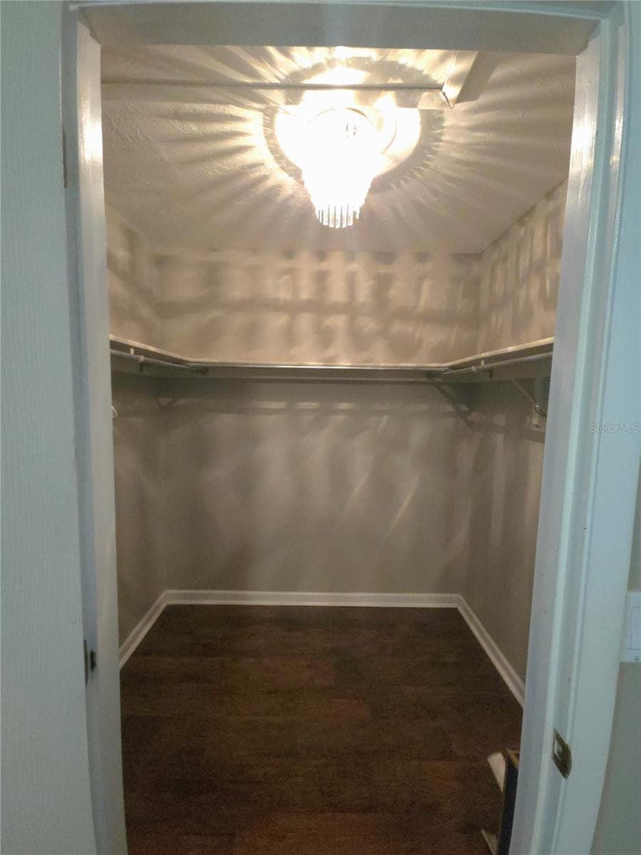 Primary walk in closet - 5699 WESTWIND LN, SARASOTA