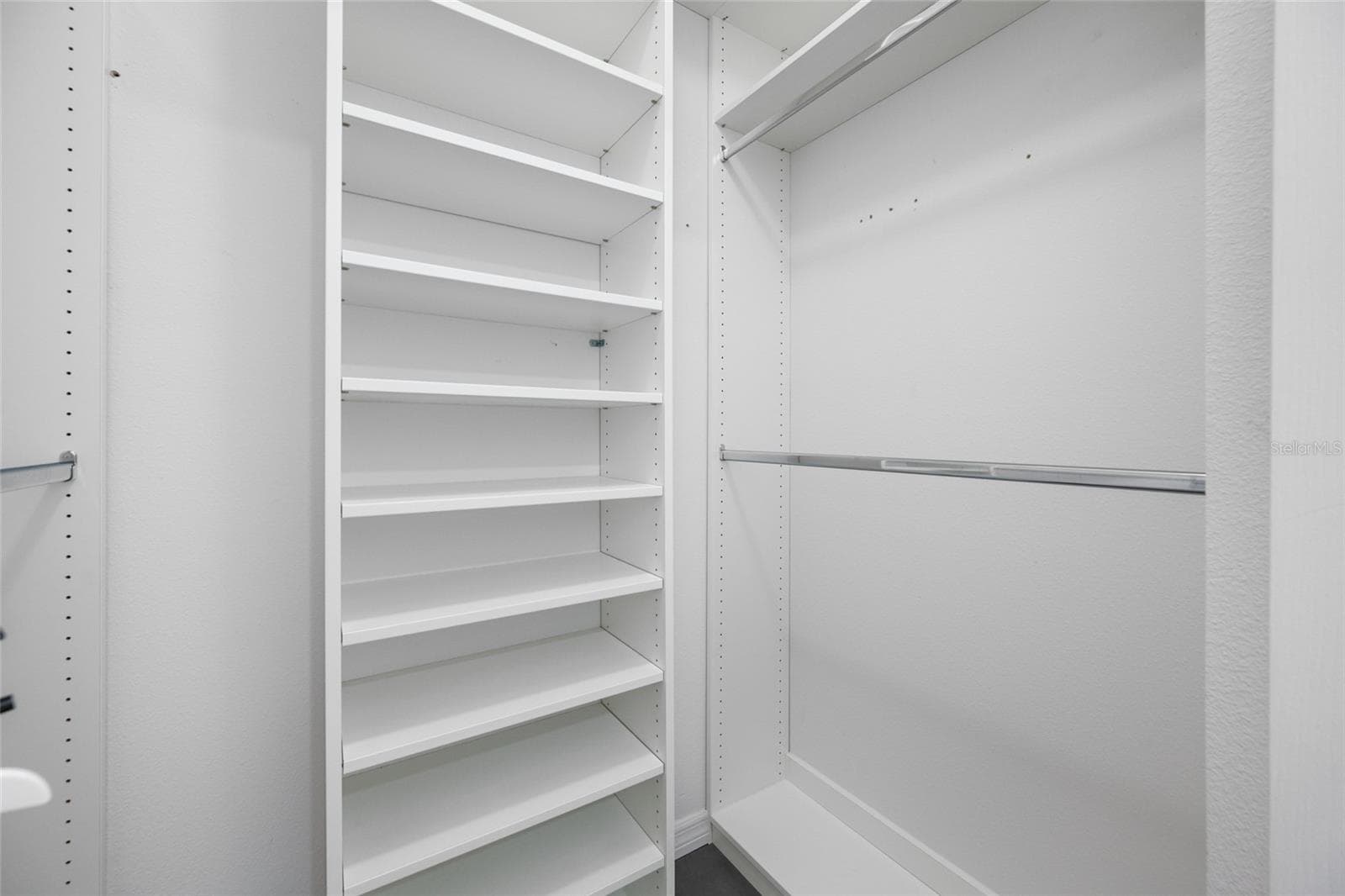 Master closet with custom built-in cabinetry - 642 WELLS CT #402, CLEARWATER