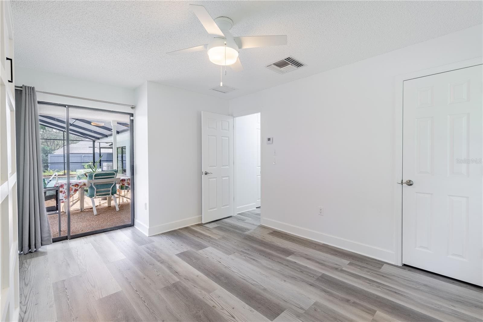 Bedroom #3 with sliding door that leads to the pool - 33816 SPRING DR, LEESBURG