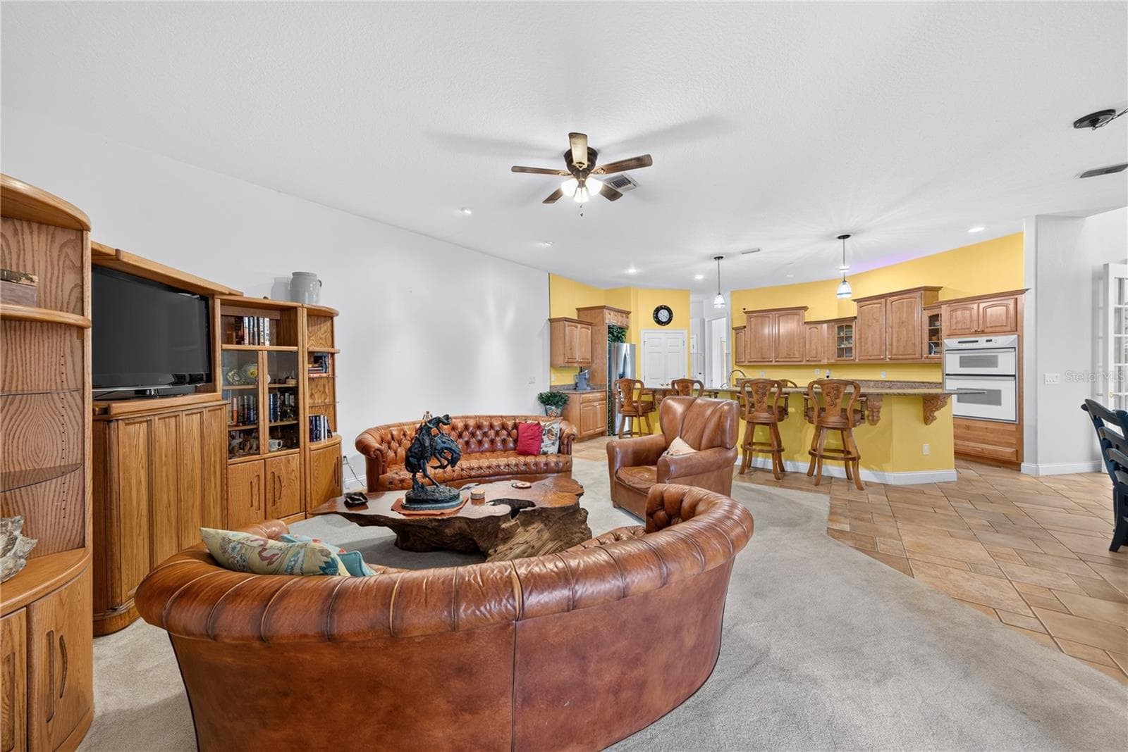 Family room open to the kitchen. - 2335 FOREST CLUB DR, ORLANDO