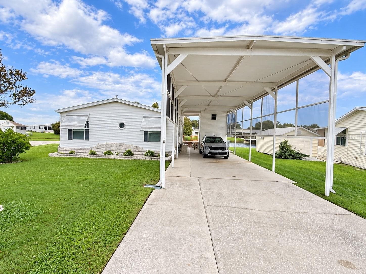 Manufactured Home at 4986 MOUNT OLIVE SHORES DR, POLK CITY, photo 2 of 24