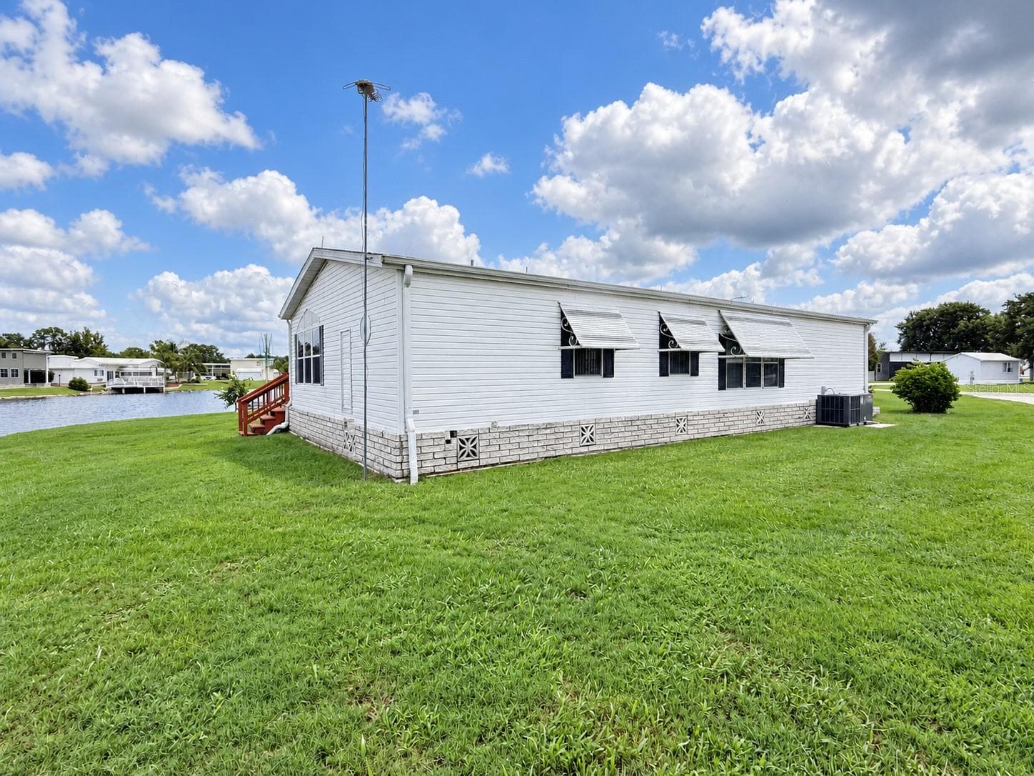 Manufactured Home at 4986 MOUNT OLIVE SHORES DR, POLK CITY, photo 4 of 24