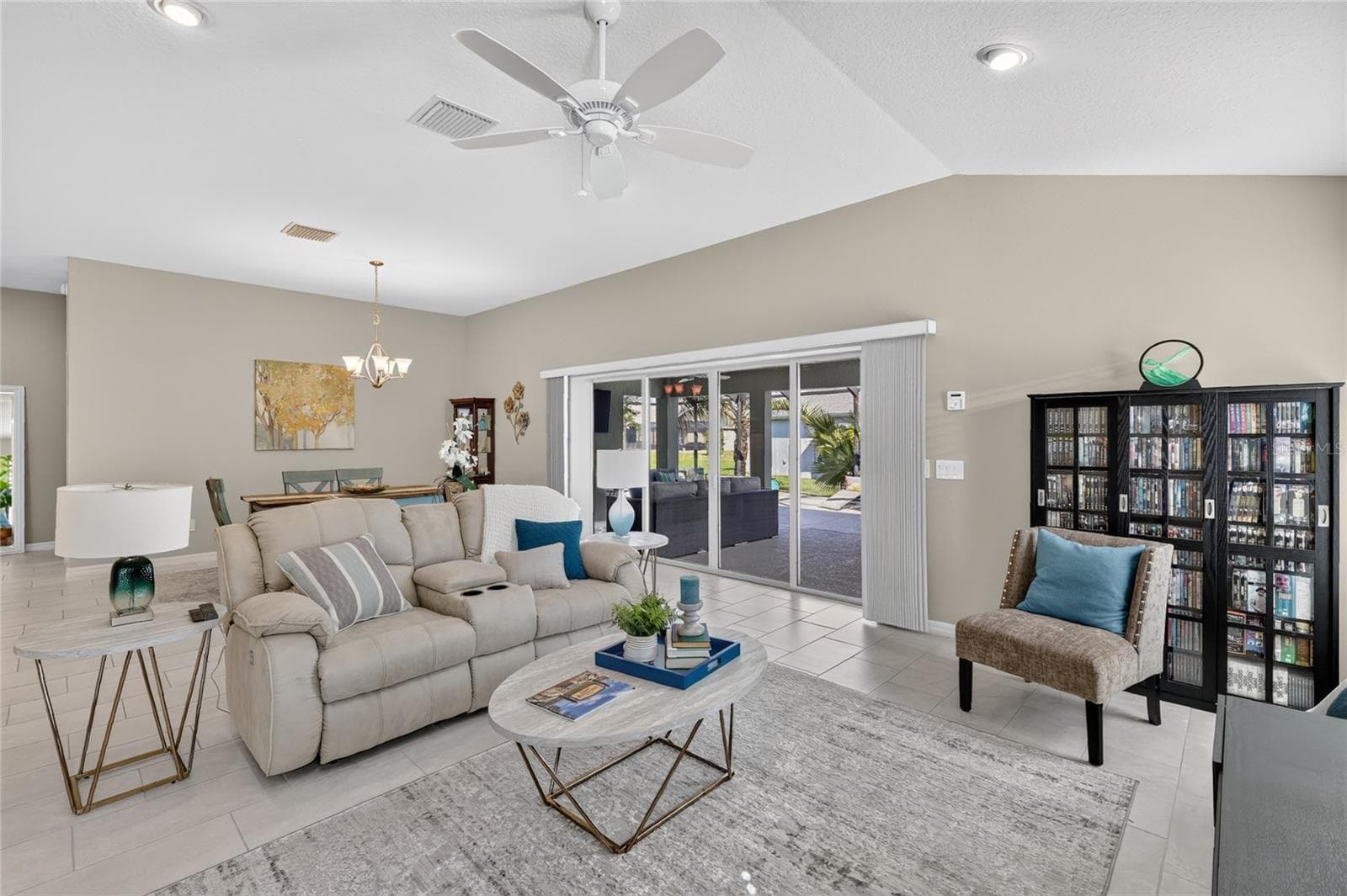 LIVING ROOM WITH VIEW TO LANAI - 5825 FLINT LOOP, THE VILLAGES
