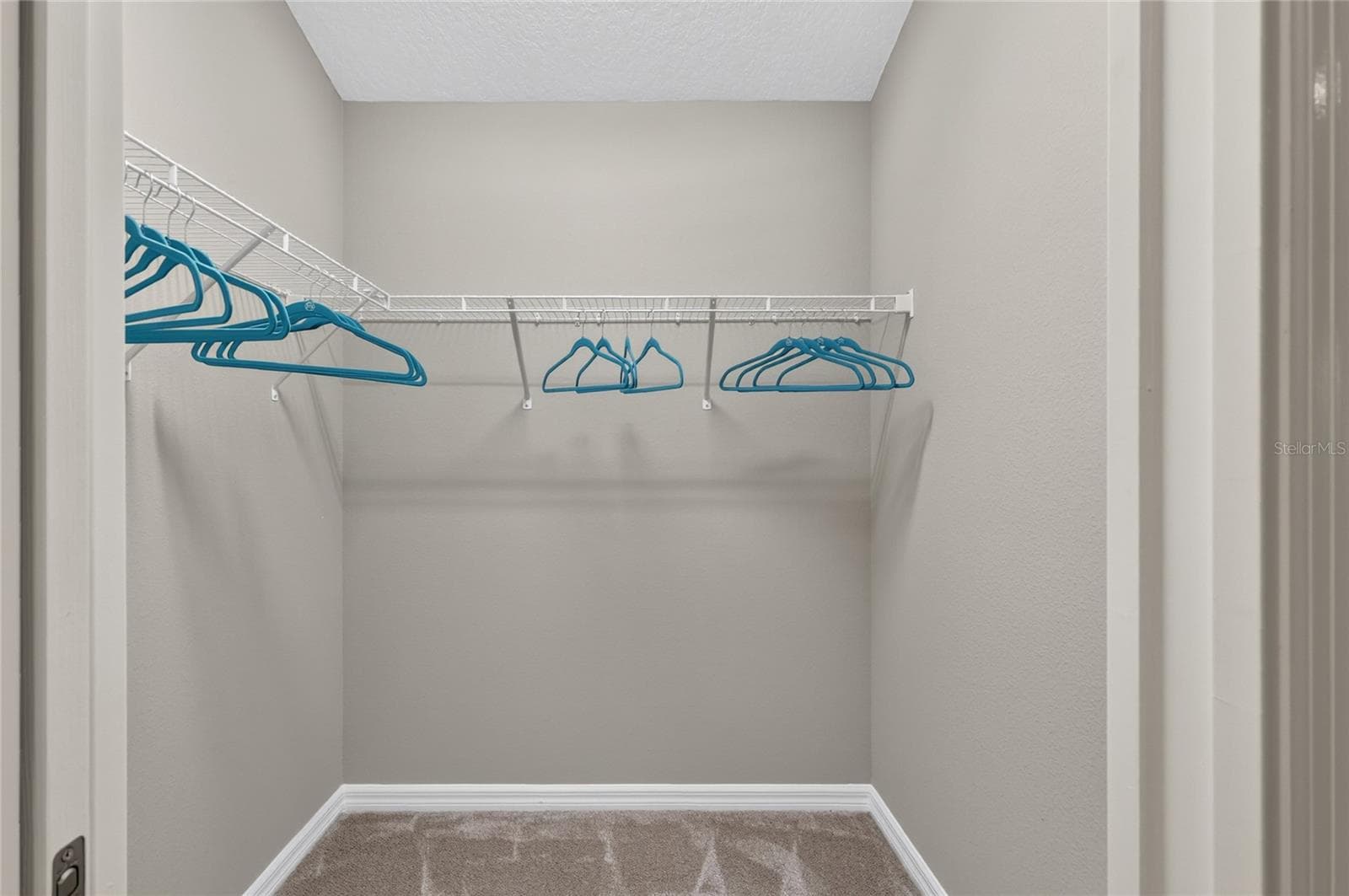 PRIMARY WALK IN CLOSET - 5825 FLINT LOOP, THE VILLAGES