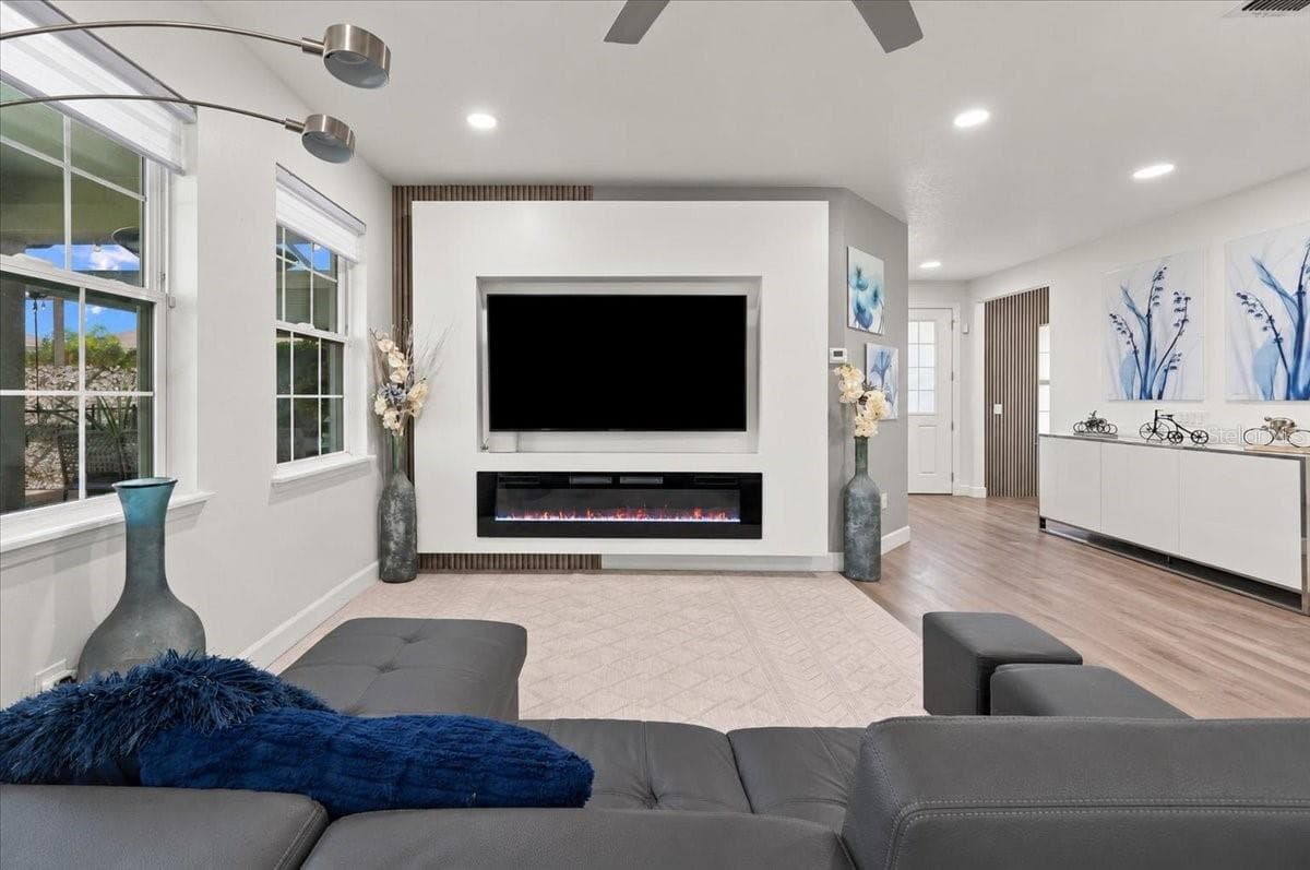 Living room with gas fireplace - 3020 CARDILLINO WAY, KISSIMMEE